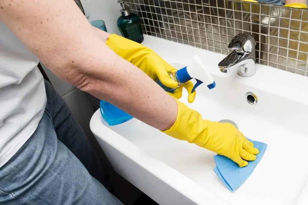 how to clean sink overflow