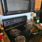 madison deep cleaning stovetop before